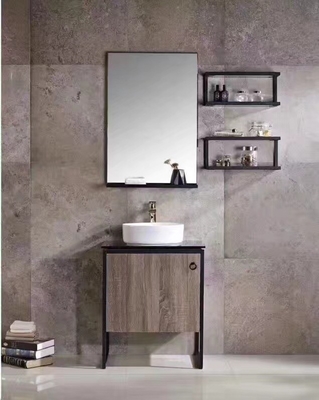 La pequeña vanidad del cuarto de baño de la madera contrachapada con construido en piernas del acero inoxidable del fregadero escoge el lavabo